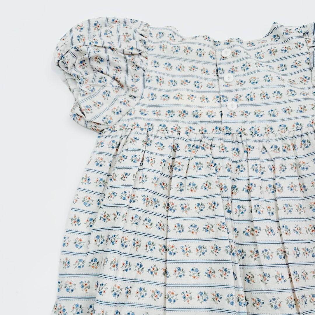 Floral patterned dress on a white background